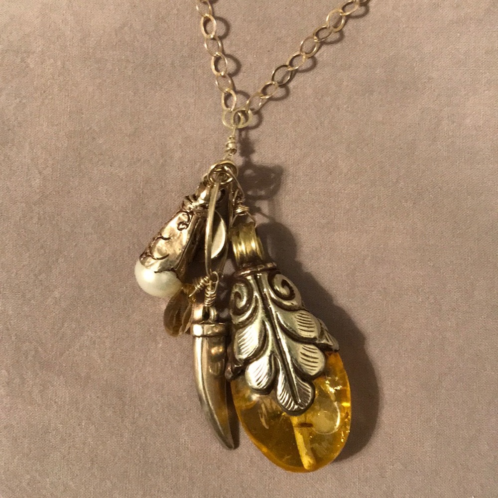 Silver necklace with amber charm